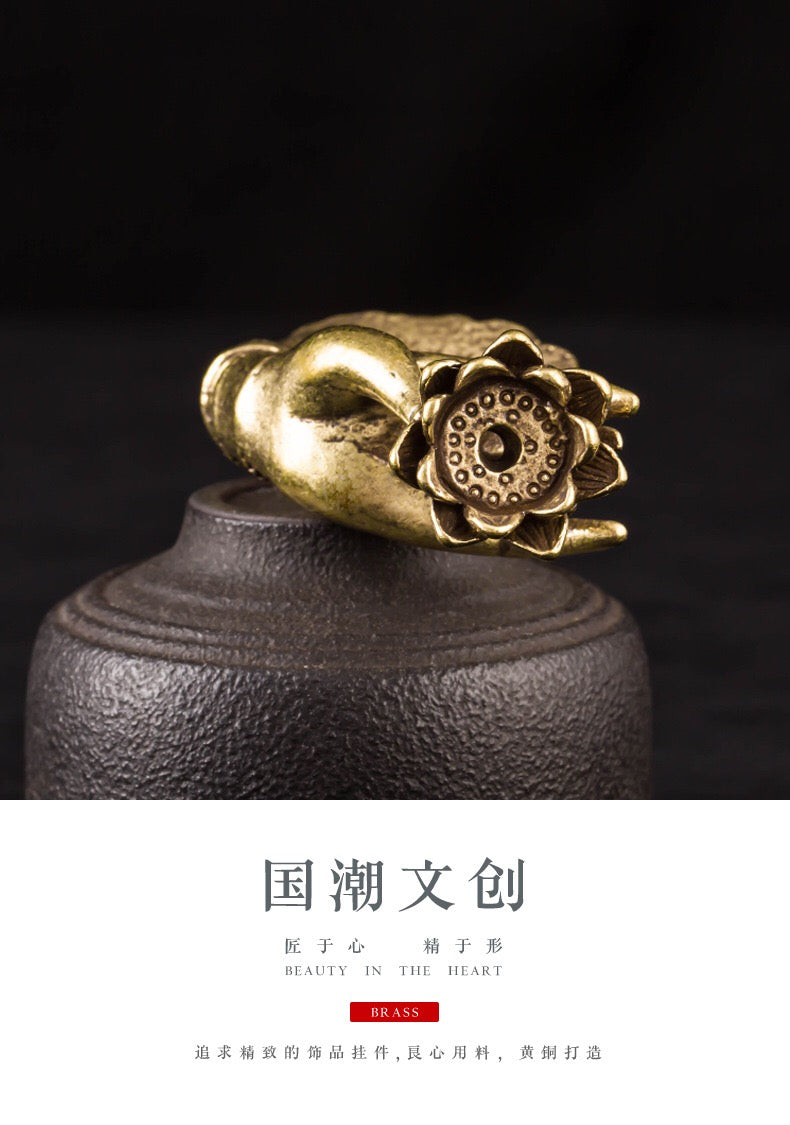 Exquisite brass Buddha hand holding lotus aromatherapy burner | An ideal home decoration for creating a meditation space