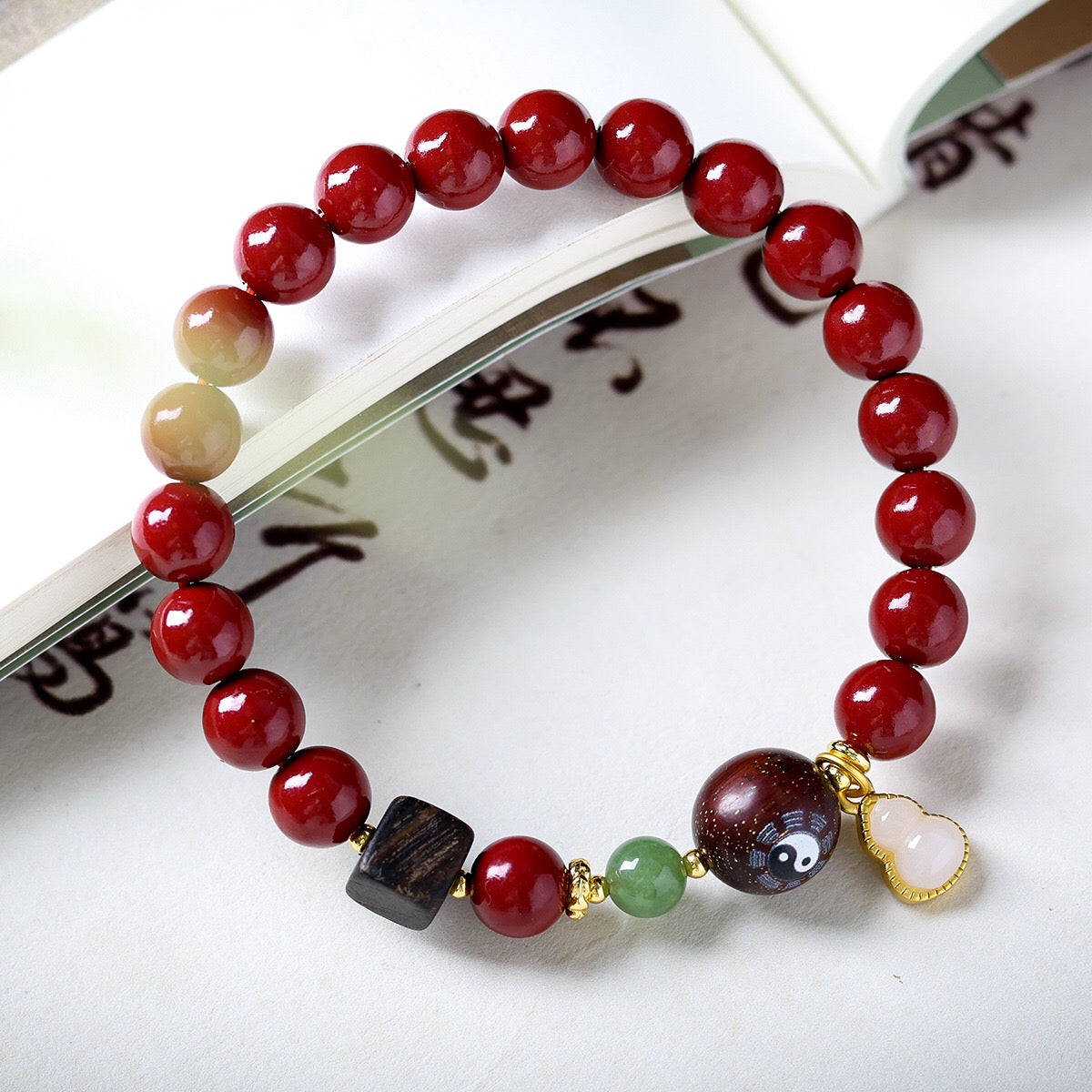 Natural obsidian white jade bodhi Taoist Tai Chi Yin Yang bracelet | Feng Shui protection and blessing fortune-changing popular nine palaces and eight trigrams red agate bracelet | Ancient cultural popular bracelet jewelry to attract wealth and good luck